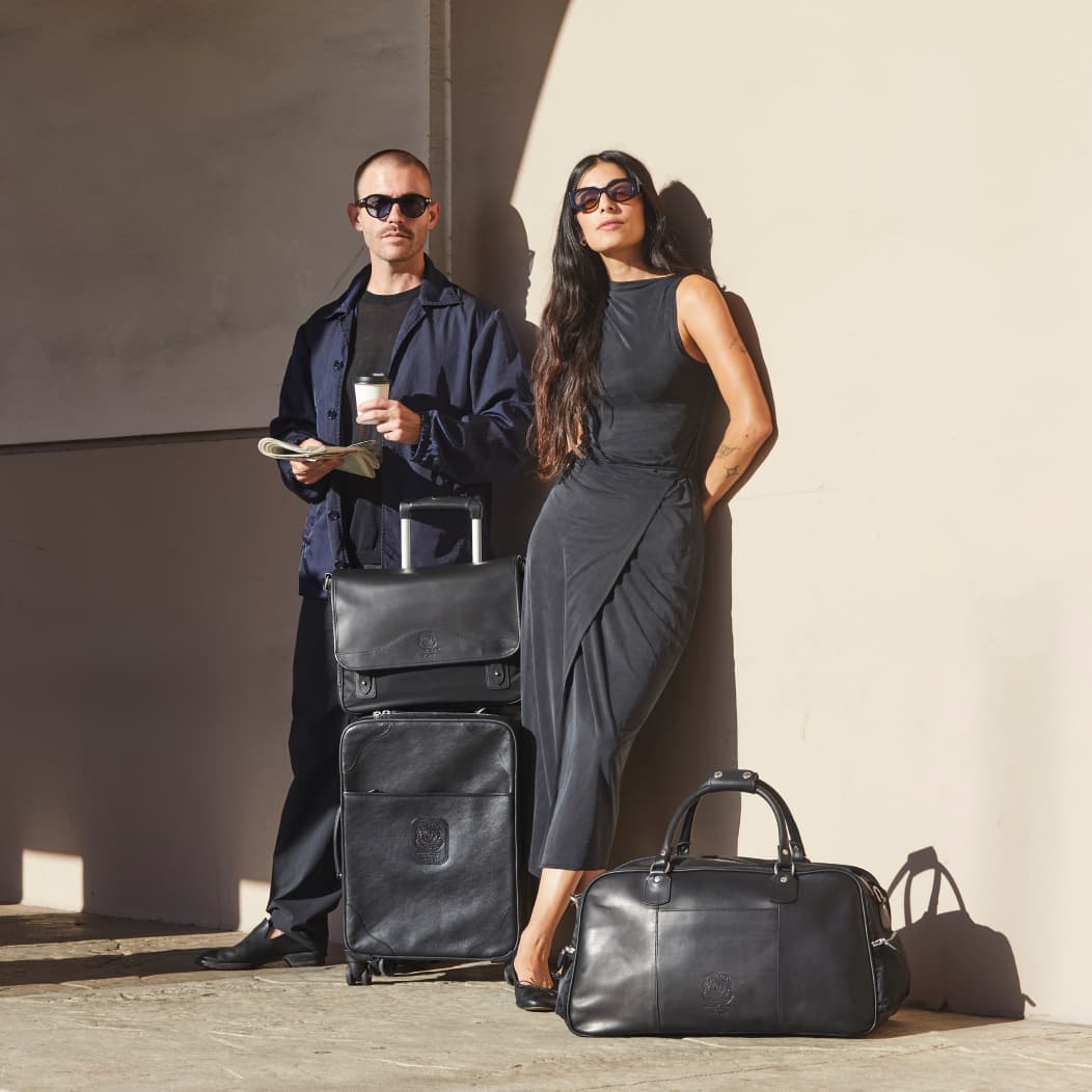 Couple with Ghurka leather luggage